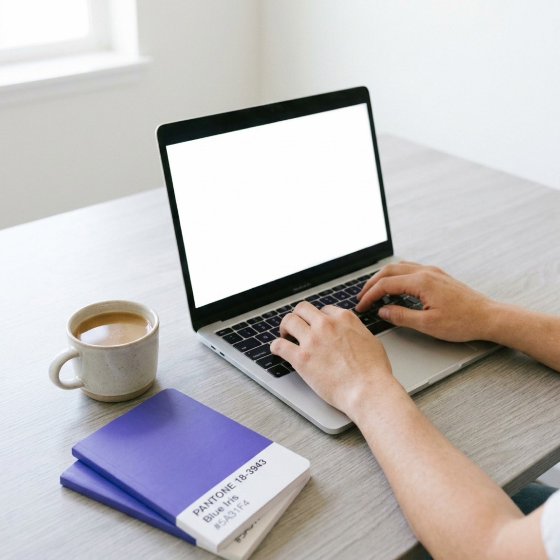 A founder reviewing campaign creative on a laptop